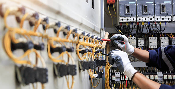 Professional Electrician technician working in Bettendorf, IA
